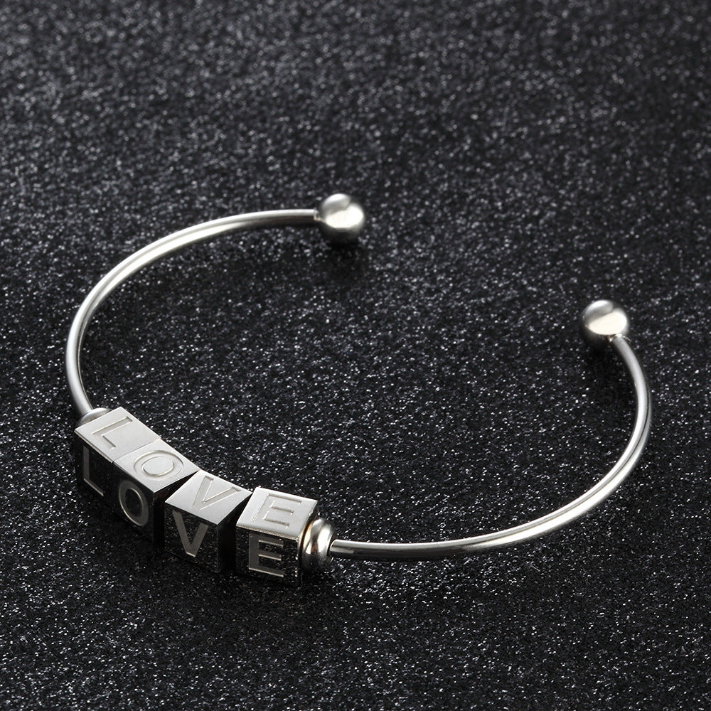 Adjustable silver bangle with alphabet cube charms – LOVE design
