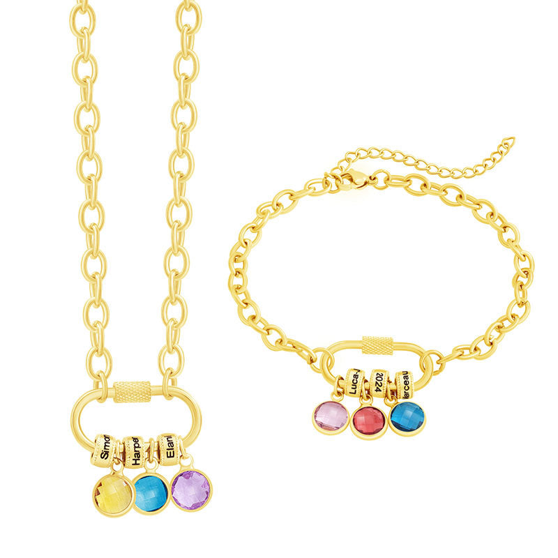 A two-part jewelry set with a pendant and a bracelet, featuring colorful gemstones and metallic clasps, displayed on a surface with pink crystals.