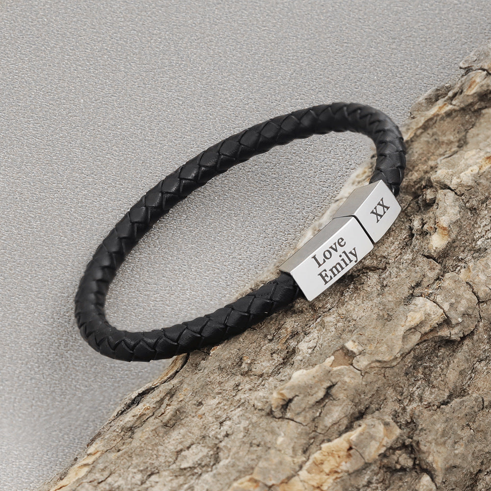 Custom black leather bracelet with engraved clasp – front view